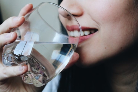 Woman drinking a glass of water
