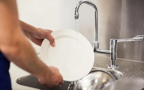 Person washing dishes